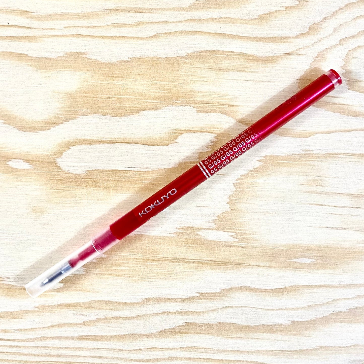 A refill cartridge with red ink.