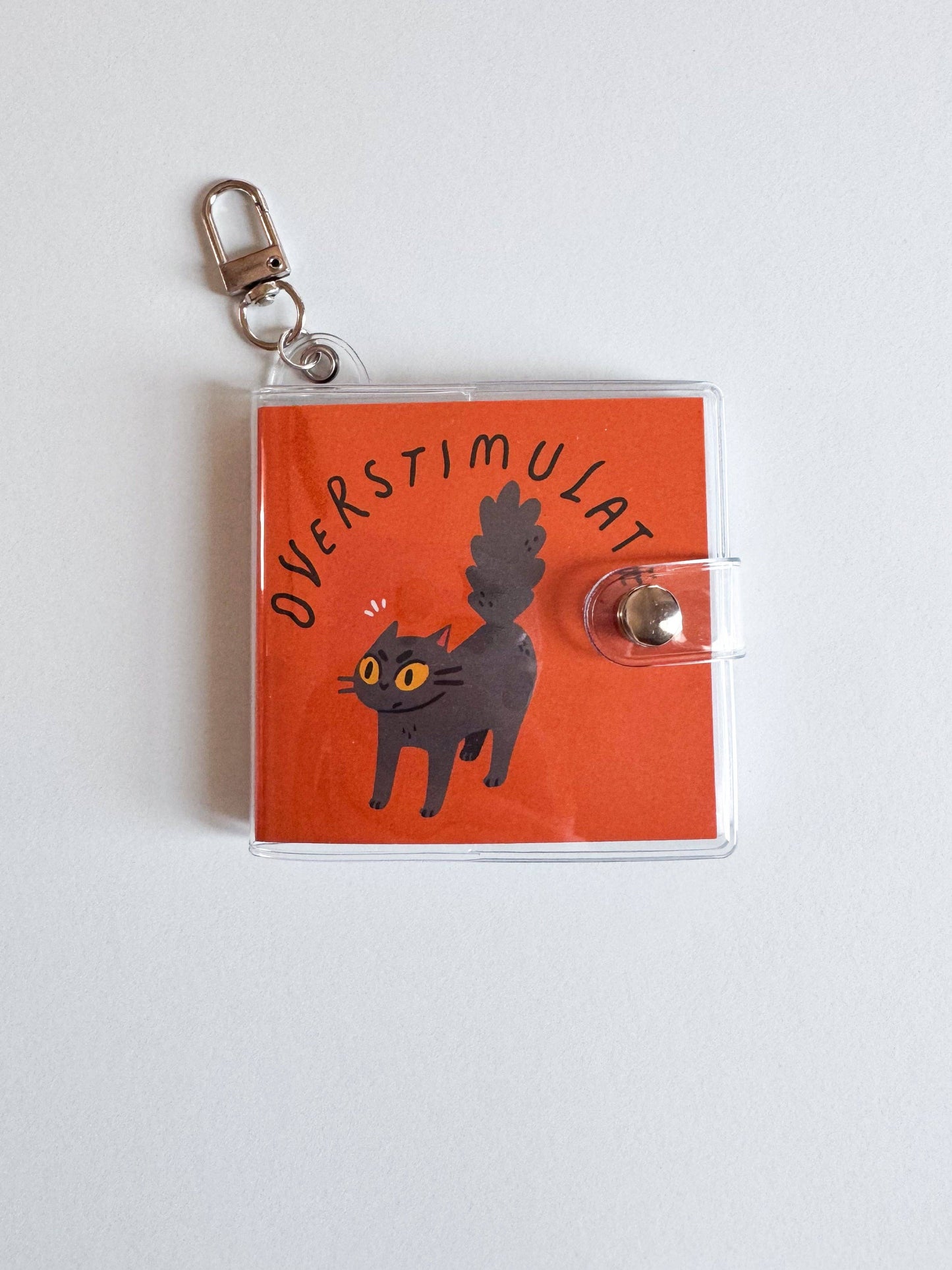 Mini Notebook Bag Charm Keychain - Overstimulated Cat (Funny, Cat, ADHD)